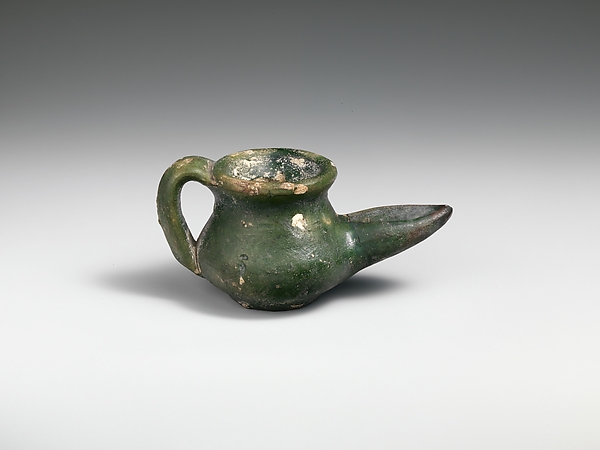 A small green-glazed earthenware lamp made near Acre during the Crusader period