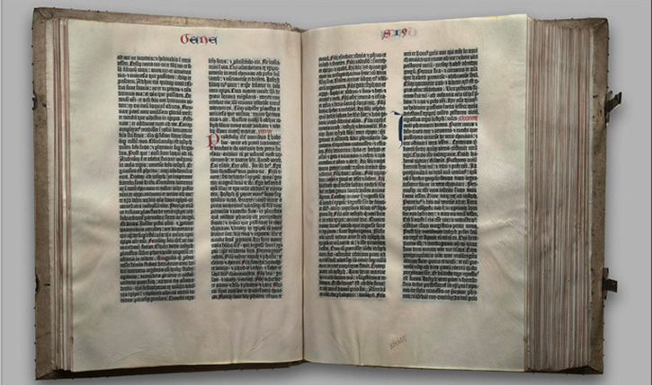 Close view of a printed and hand-decorated page from the Gutenberg Bible