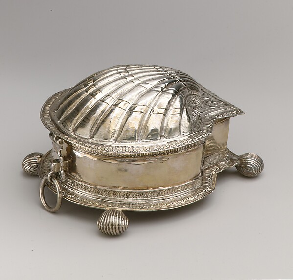 Ornate European silver box shaped like a shell